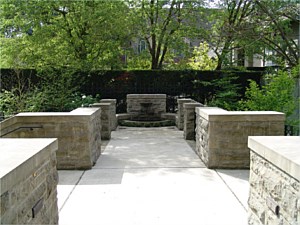 Water fountain and stone walls