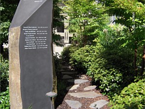 Polished basalt column memorial and garden walk